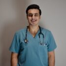 Male GP doctor in teal scrubs with stethoscope at 360 Med